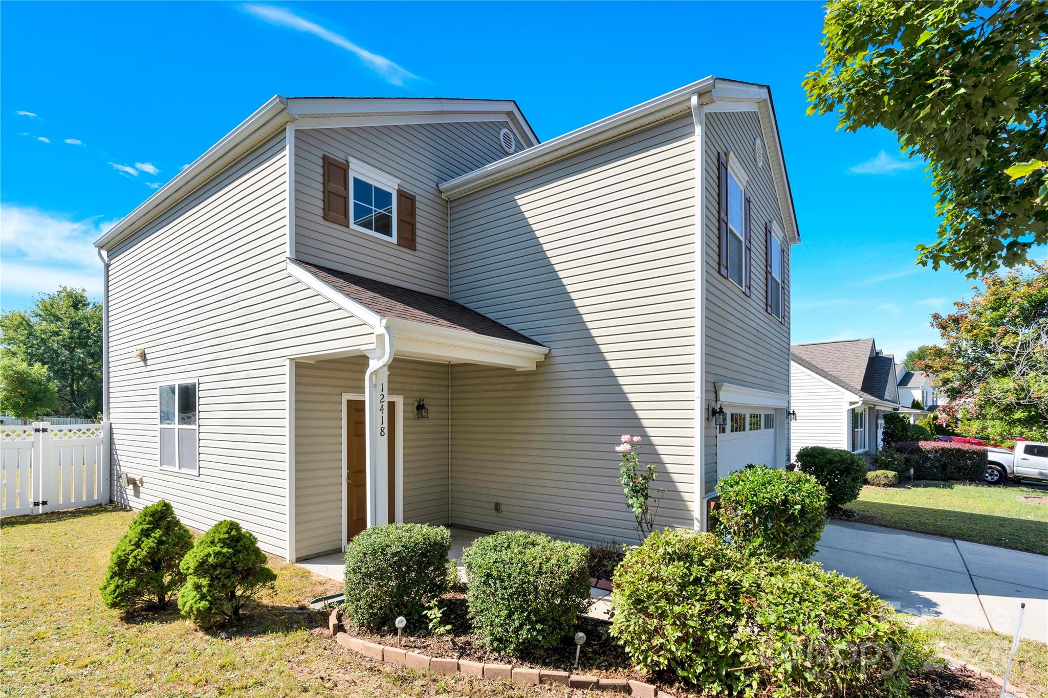 12418 Downy Birch Road Charlotte, NC 28227 - Photo 3 of 37 a view of a house with a yard