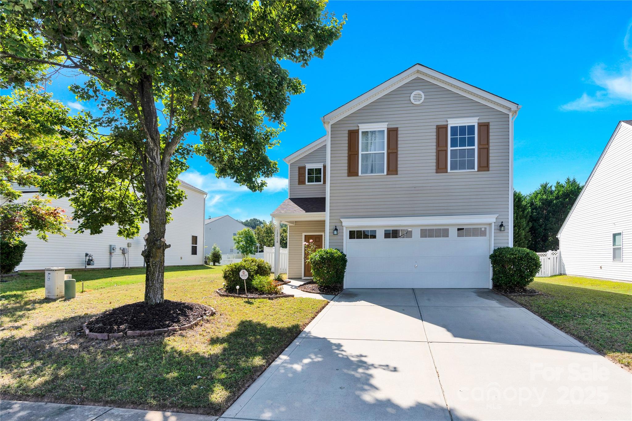 12418 Downy Birch Road Charlotte, NC 28227 - Photo 37 of 37 a front view of a house with a yard