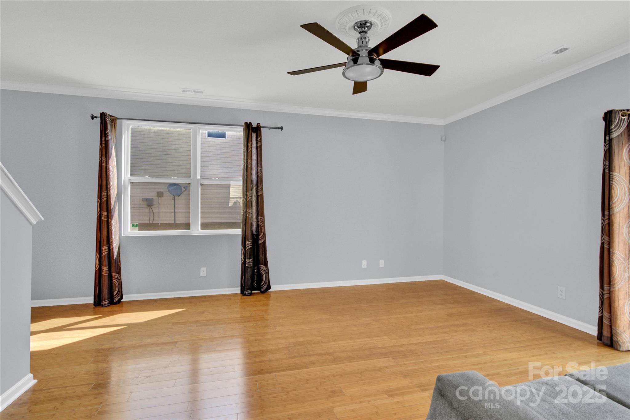 12418 Downy Birch Road Charlotte, NC 28227 - Photo 7 of 37 an empty room with a empty space and a window