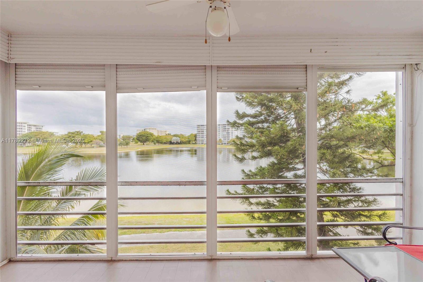 2751 North Palm Aire Drive, Unit 310 Pompano Beach, FL 33069 - Photo 13 of 70 a view of a glass door with a from balcony