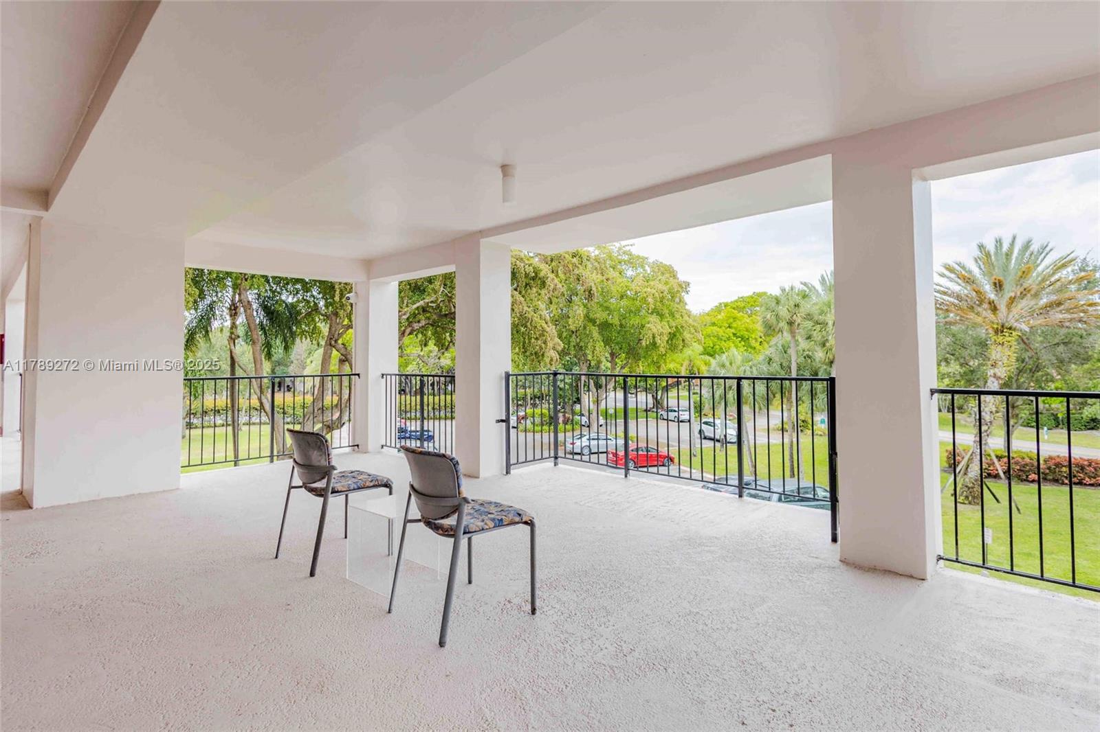 2751 North Palm Aire Drive, Unit 310 Pompano Beach, FL 33069 - Photo 47 of 70 a view of a room with balcony and ocean view