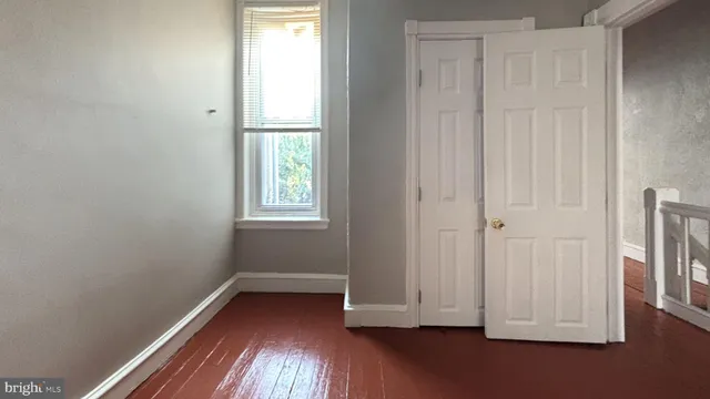 a view of small space with wooden floor