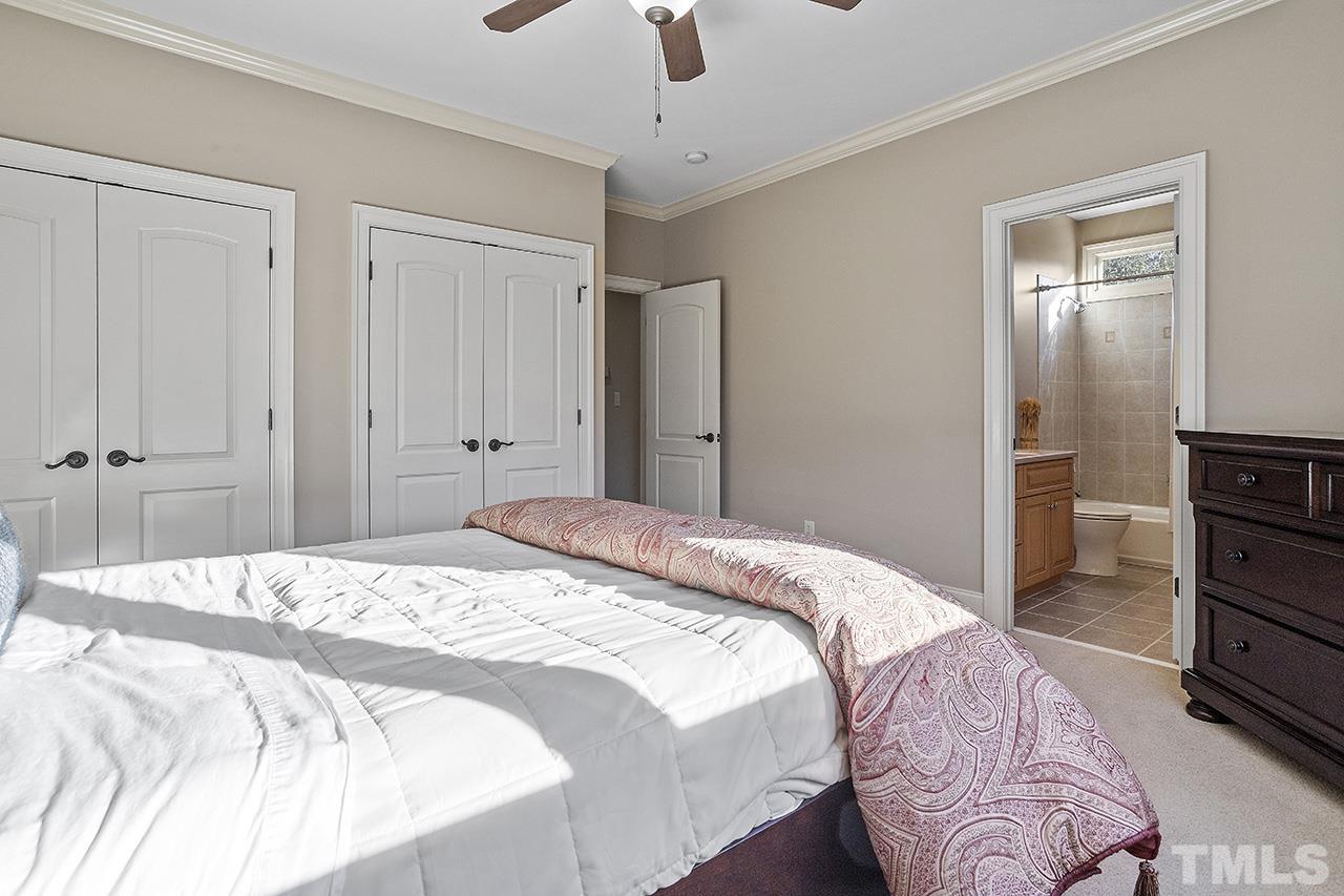 1009 Heydon Court Raleigh, NC 27614 - Photo 48 of 89 Ensuite Bedroom overlooks the beautiful backyard.