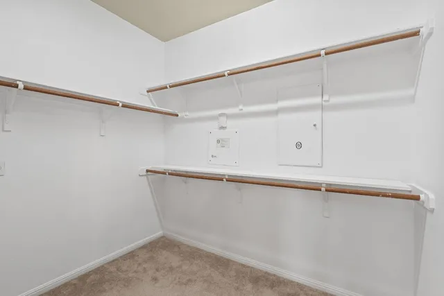 a view of an empty walk in closet