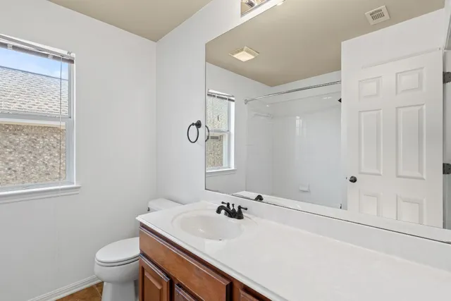 a bathroom with a sink and a toilet