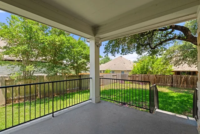 a view of a street view from a balcony