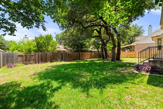 a view of a backyard with a garden