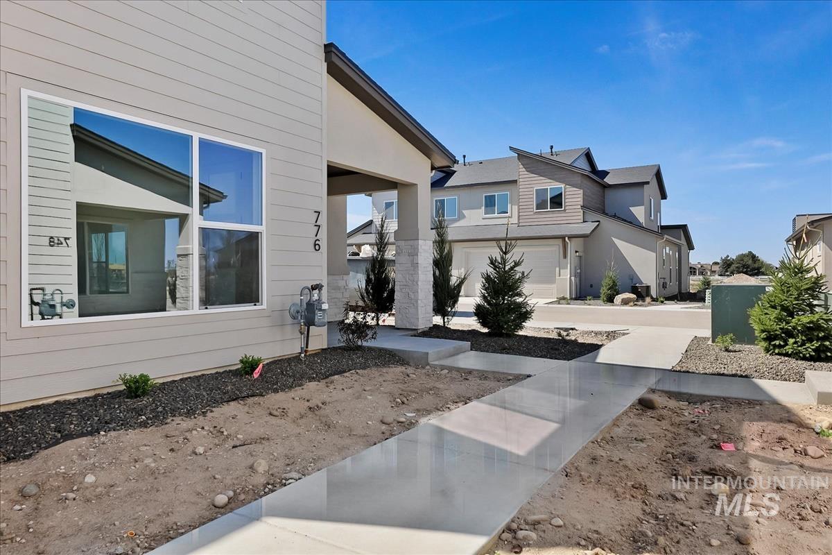 776 South Calhoun Lane Star, ID 83669 - Photo 2 of 49 Contemporary exterior with a covered entry and address numbers