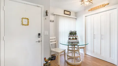 a table with a sink and cabinets