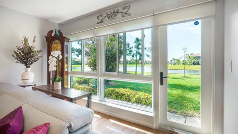 a room with furniture and a window