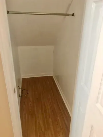 a view of a room with racks on the wall