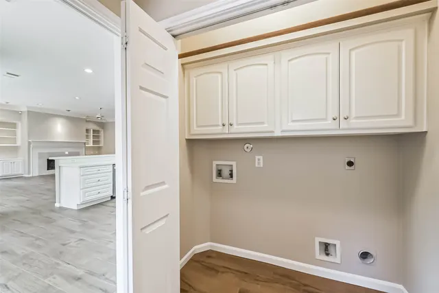 a view of cabinets and window