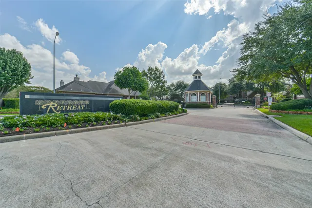 a front view of a building with garden