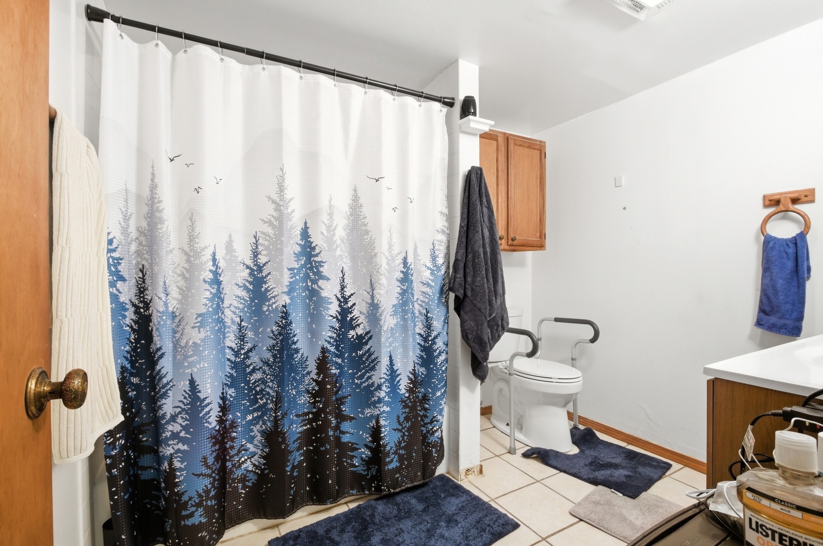 154 East Bailey Road, Unit D Naperville, IL 60565 - Photo 14 of 20 a white toilet sitting next to a shower curtain