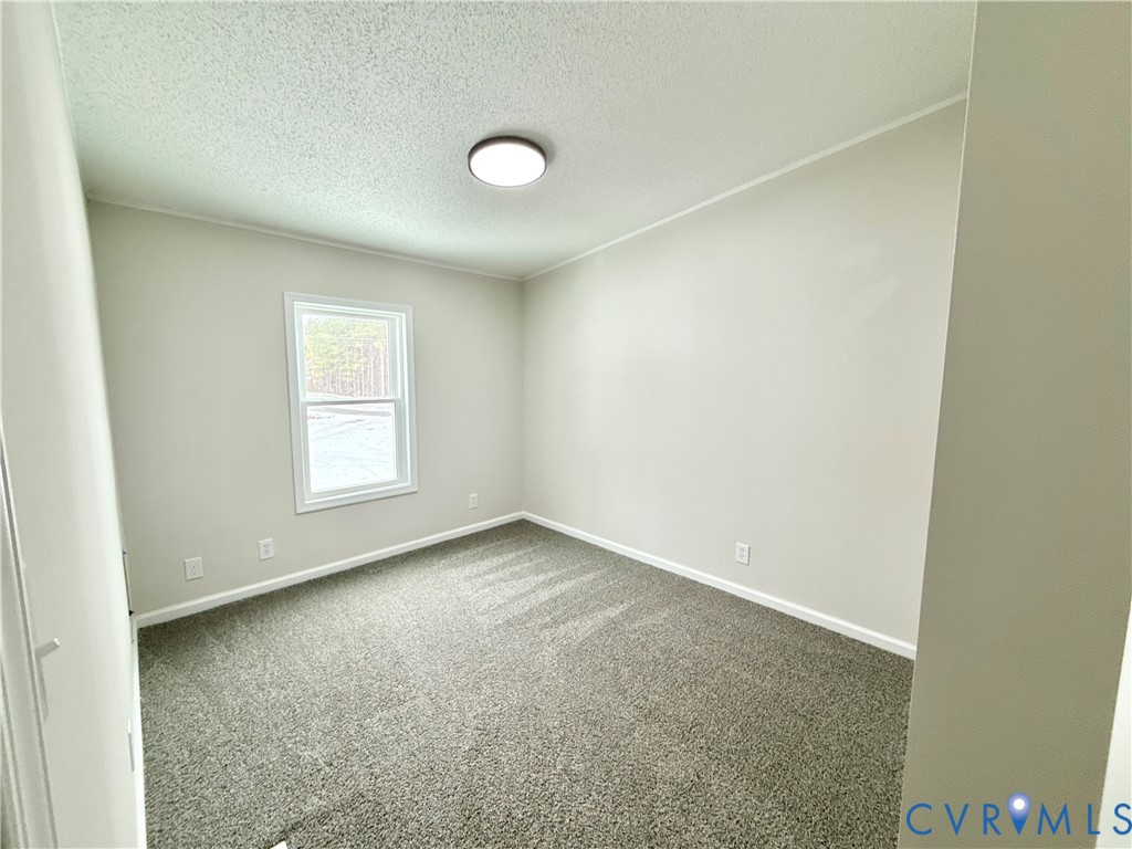 1500 Webster Road Glade Hill, VA 24092 - Photo 17 of 22 an empty room with windows