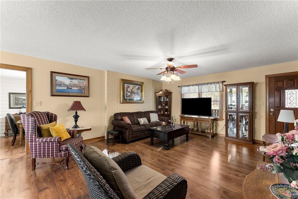 312 Ashley Brook Drive Lula, GA 30554 - Photo 13 of 62 a living room with furniture and wooden floor