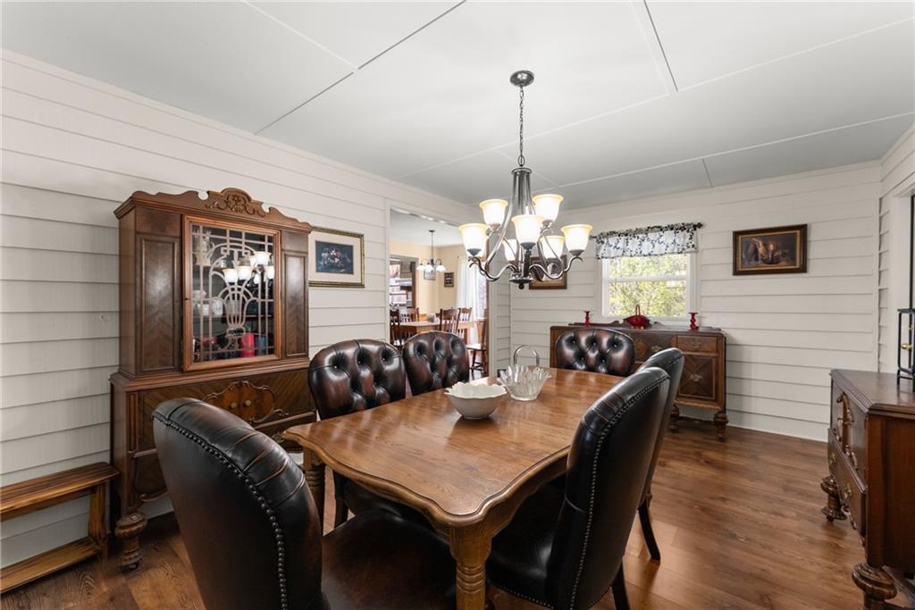 312 Ashley Brook Drive Lula, GA 30554 - Photo 16 of 62 a view of a dining room with furniture