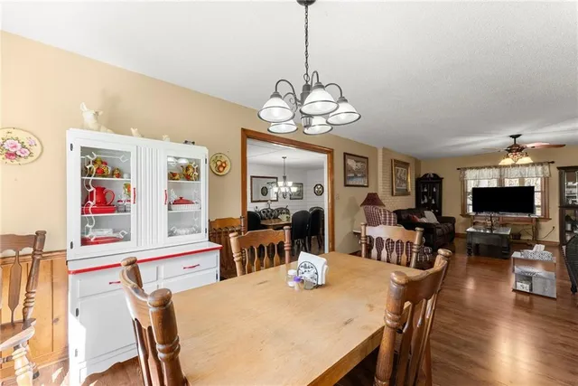 a kitchen with cabinets and stainless steel appliances