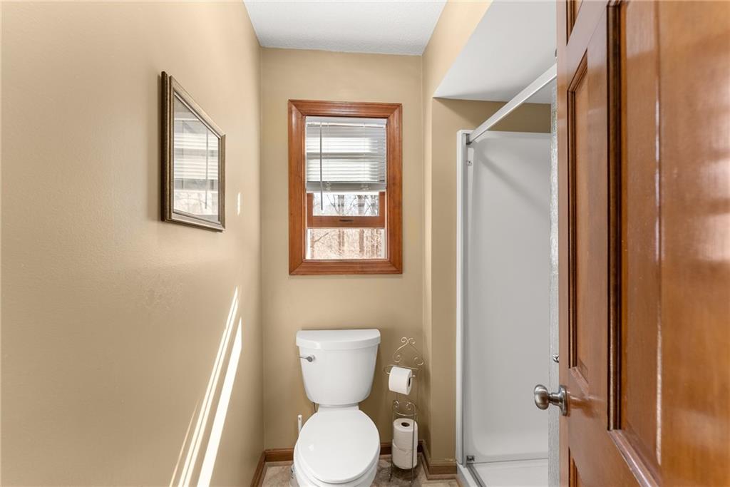 312 Ashley Brook Drive Lula, GA 30554 - Photo 24 of 62 a bathroom with a toilet