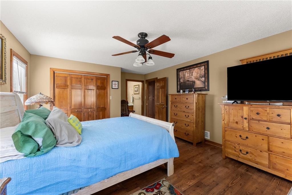 312 Ashley Brook Drive Lula, GA 30554 - Photo 27 of 62 a bedroom with a bed and flat screen tv