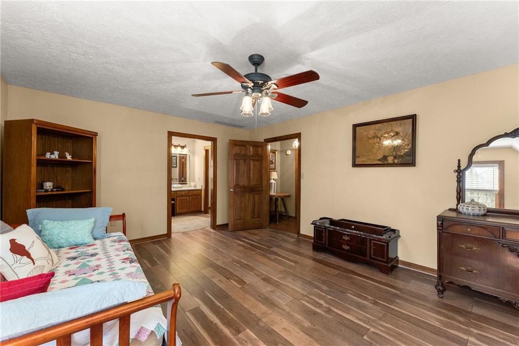 312 Ashley Brook Drive Lula, GA 30554 - Photo 35 of 62 a living room with furniture and wooden floor