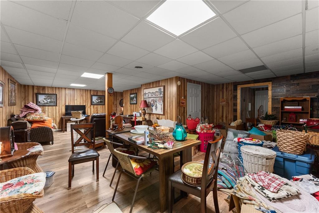 312 Ashley Brook Drive Lula, GA 30554 - Photo 37 of 62 a living room with lots of furniture and a wooden floor