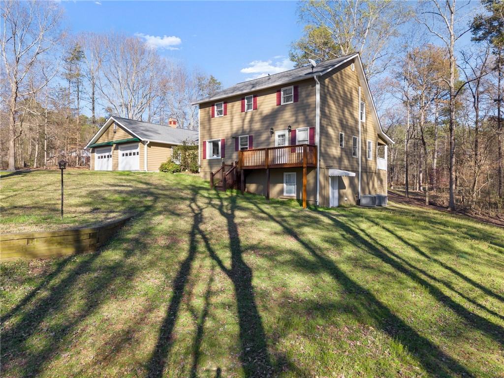 312 Ashley Brook Drive Lula, GA 30554 - Photo 50 of 62 a view of a house with a yard
