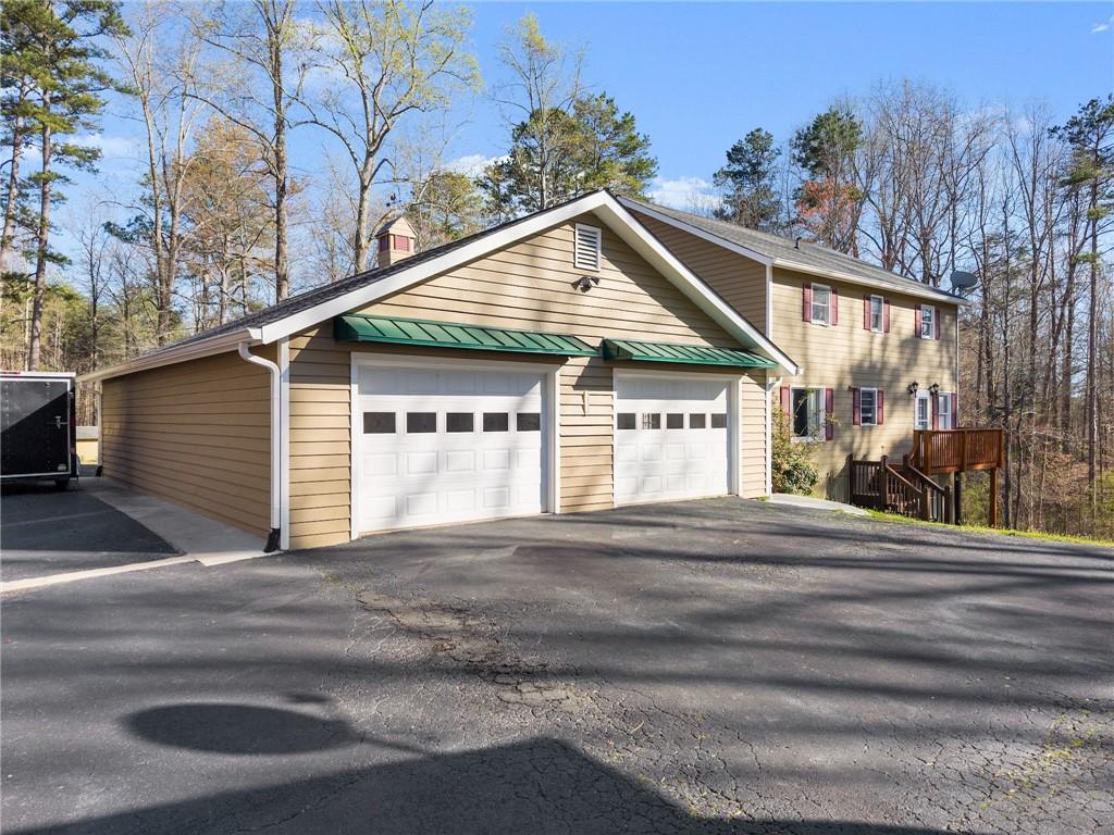 312 Ashley Brook Drive Lula, GA 30554 - Photo 52 of 62 a view of a house with a yard