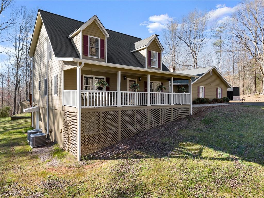 312 Ashley Brook Drive Lula, GA 30554 - Photo 9 of 62 a front view of a house with a yard