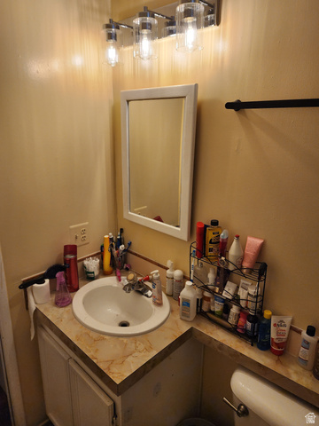11362 Crescent Park Way, Unit 8 Sandy, UT 84070 - Photo 7 of 20 Half bathroom featuring vanity