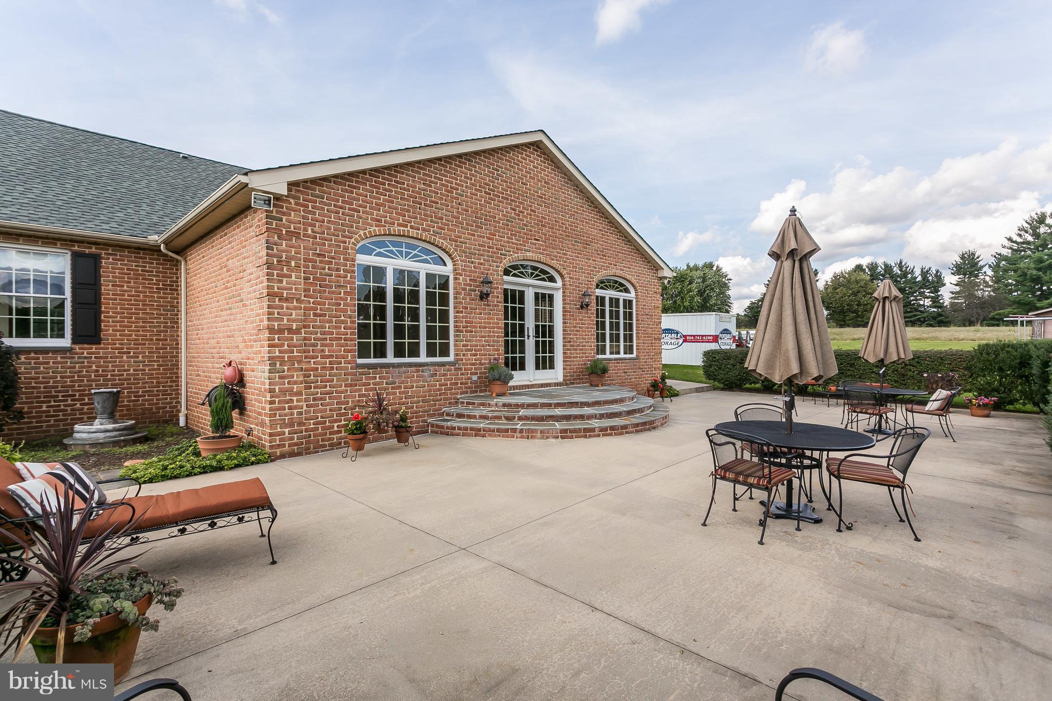 1925 Brown Road Finksburg, MD 21048 - Photo 6 of 30 a backyard of a house with outdoor seating
