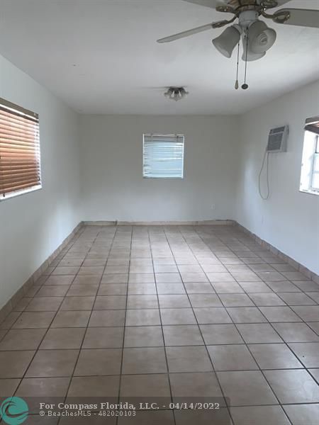 664 Southeast 8th Place Hialeah, FL 33010 - Photo 11 of 16 a view of an empty room and window