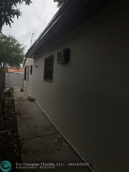 664 Southeast 8th Place Hialeah, FL 33010 - Photo 14 of 16 a backyard of a house with seating space