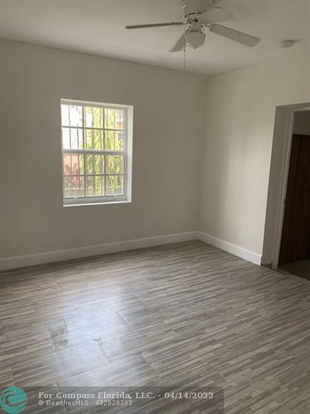 664 Southeast 8th Place Hialeah, FL 33010 - Photo 4 of 16 an empty room with a window