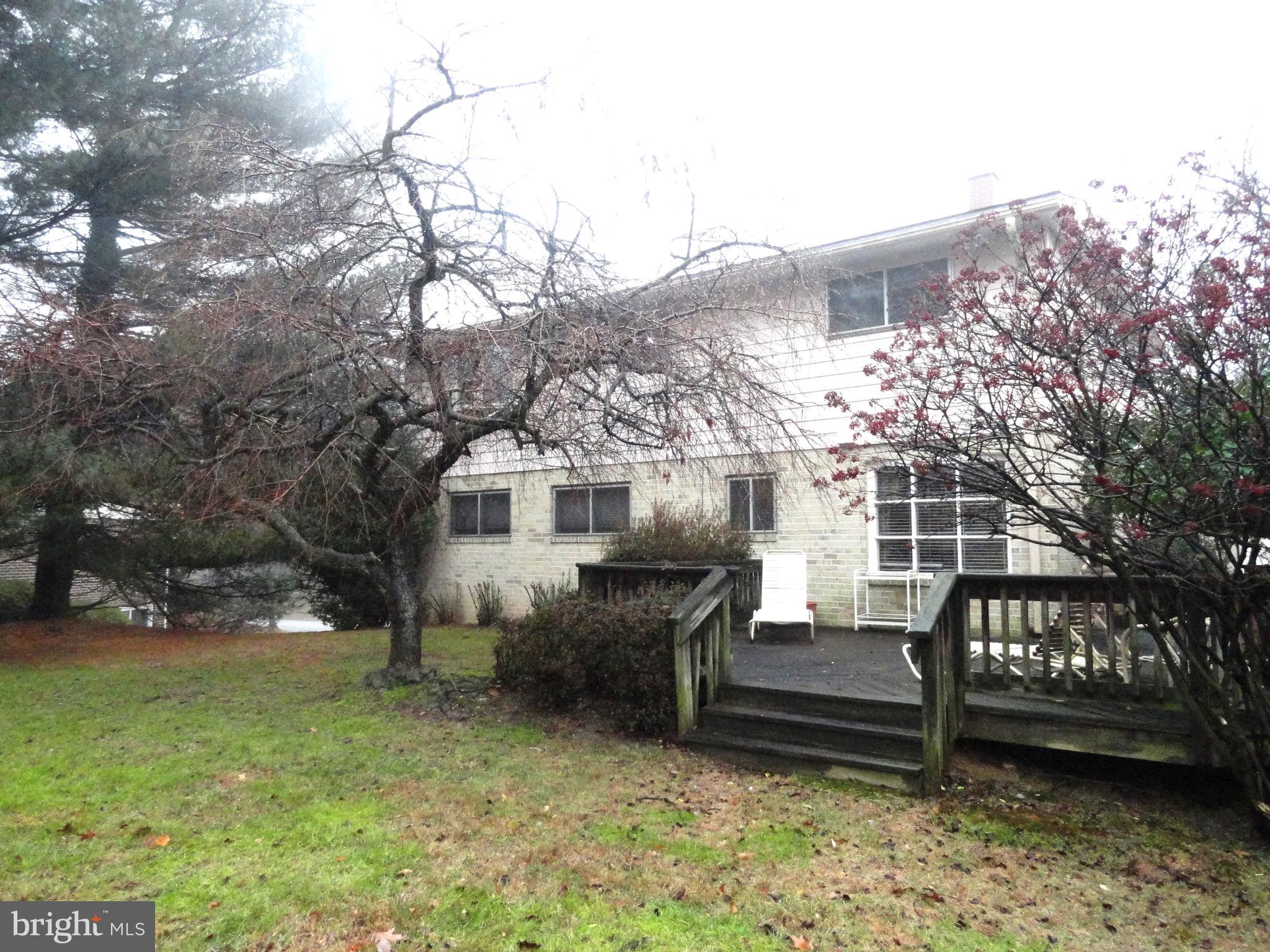 7212 Verbena Road Baltimore, MD 21209 - Photo 2 of 3 REAR EXTERIOR SHOWING DECK