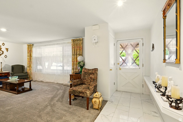 1188 600 East Logan, UT 84341 - Photo 7 of 16 Foyer entrance with light marble finish flooring and baseboards