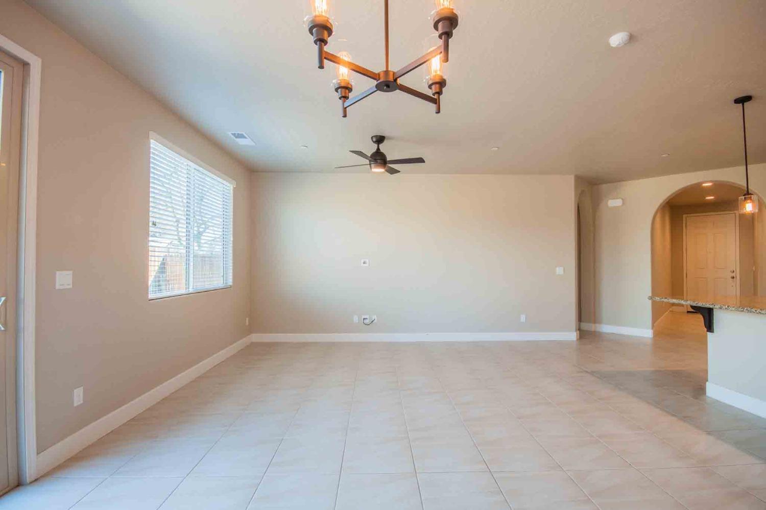 3439 Brimhall Lane Clovis, CA 93619 - Photo 14 of 43 a view of an empty room with a window