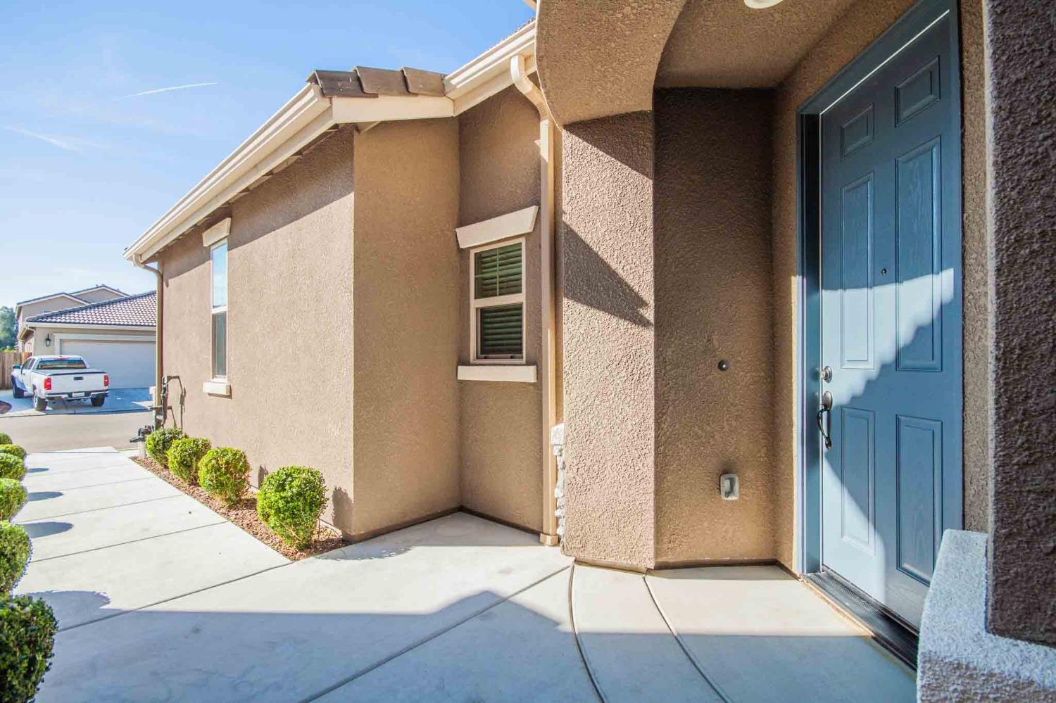 3439 Brimhall Lane Clovis, CA 93619 - Photo 3 of 43 a view of a house with a backyard