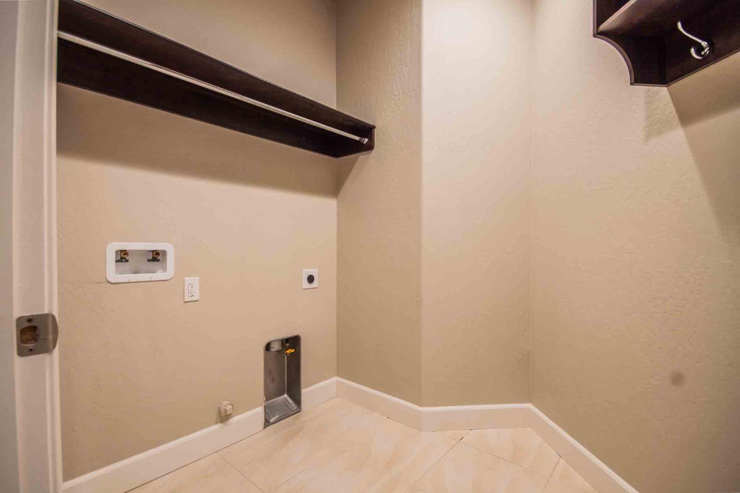 3439 Brimhall Lane Clovis, CA 93619 - Photo 43 of 43 a bathroom with a shower and a sink