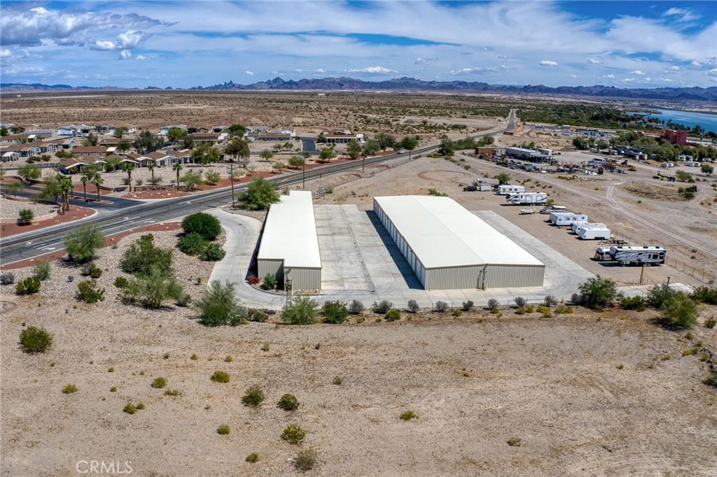 12555 Havasu Lake Road Needles, CA 92363 - Photo 3 of 13 an aerial view of a house with a yard