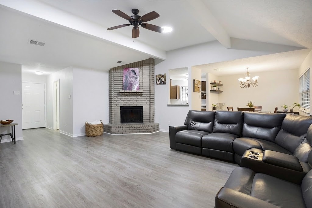 24127 Spring Day Lane Spring, TX 77373 - Photo 3 of 12 Seamless open-concept living space highlighting high ceilings and easy entertaining flow.