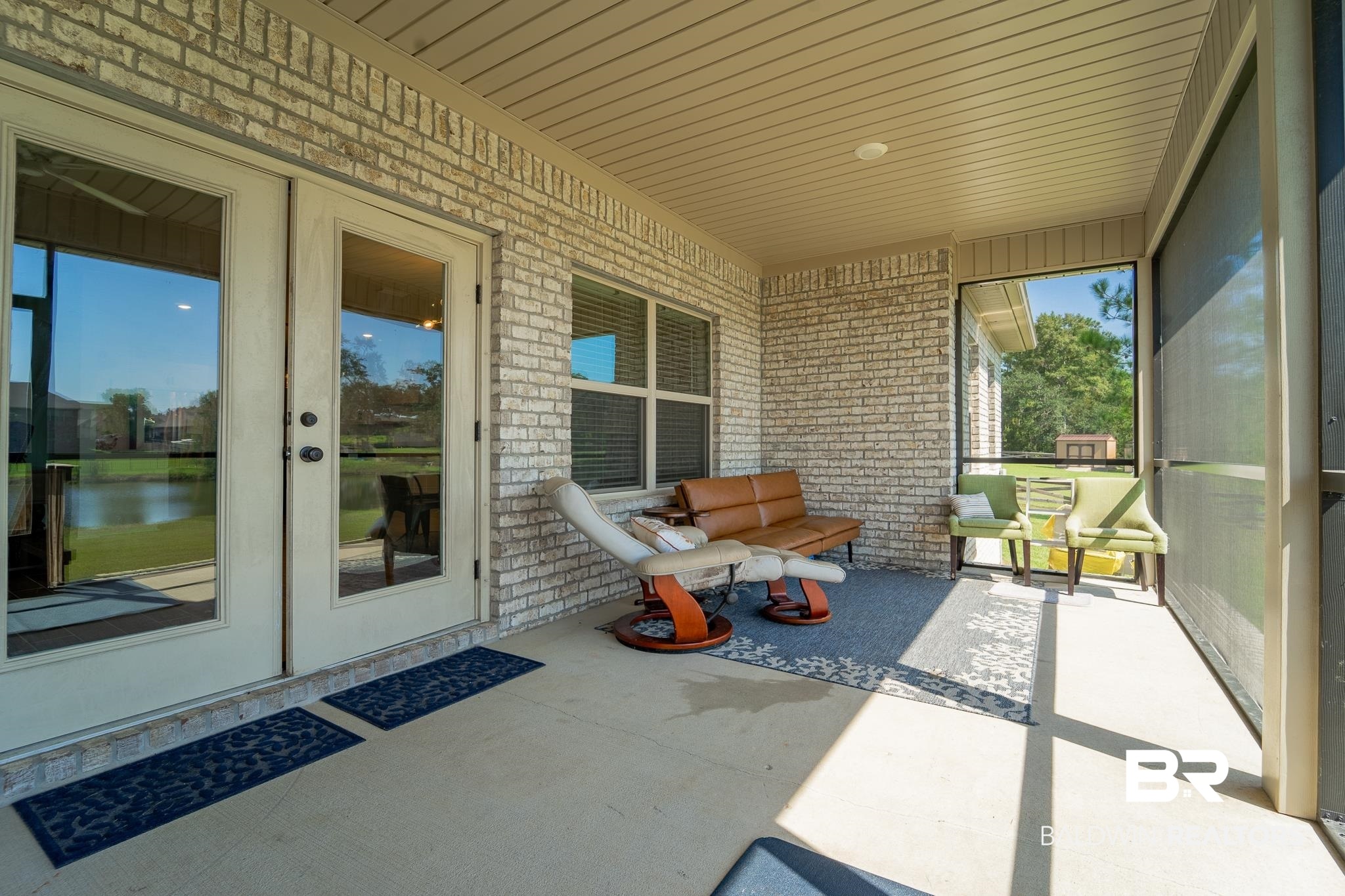 10975 Legacy Lane Mobile, AL 36608 - Photo 35 of 40 Unfurnished sunroom featuring a water view