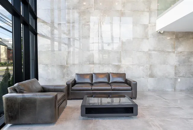 a front view of a building with garden