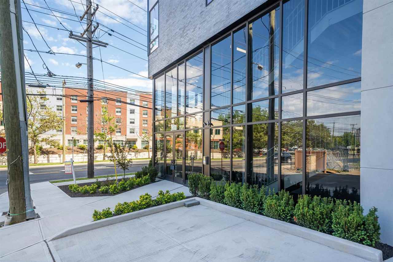 8621 River Road, Unit 3D North Bergen, NJ 07047 - Photo 18 of 22 a front view of a building with garden