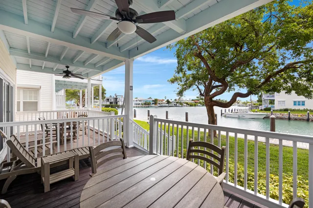 a view of a balcony with wooden floor