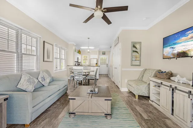 a living room with furniture and a table