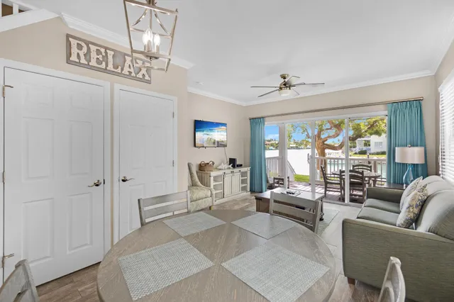 a kitchen with stainless steel appliances granite countertop a refrigerator a stove and a sink