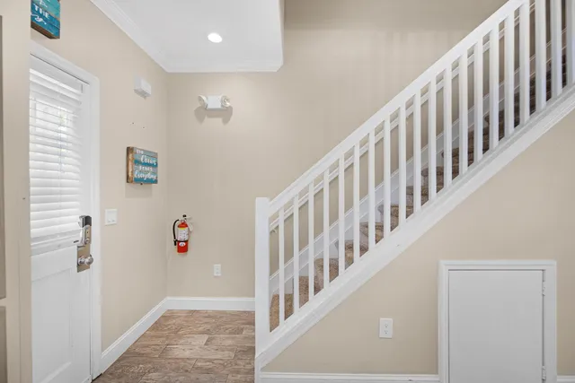 a kitchen with stainless steel appliances and white cabinets