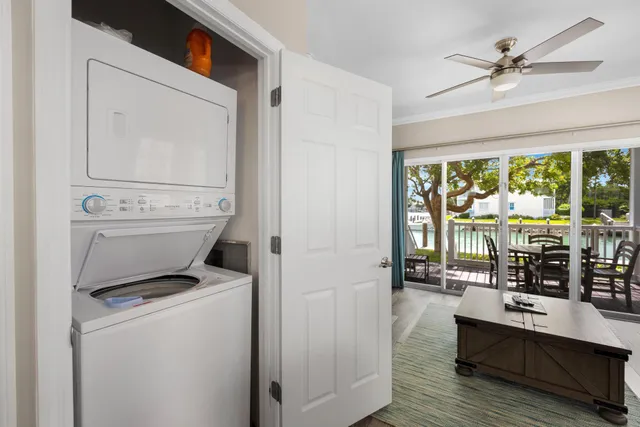 a view of living room with furniture and window