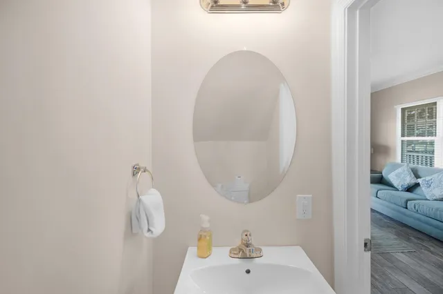 a bathroom with a sink and a mirror